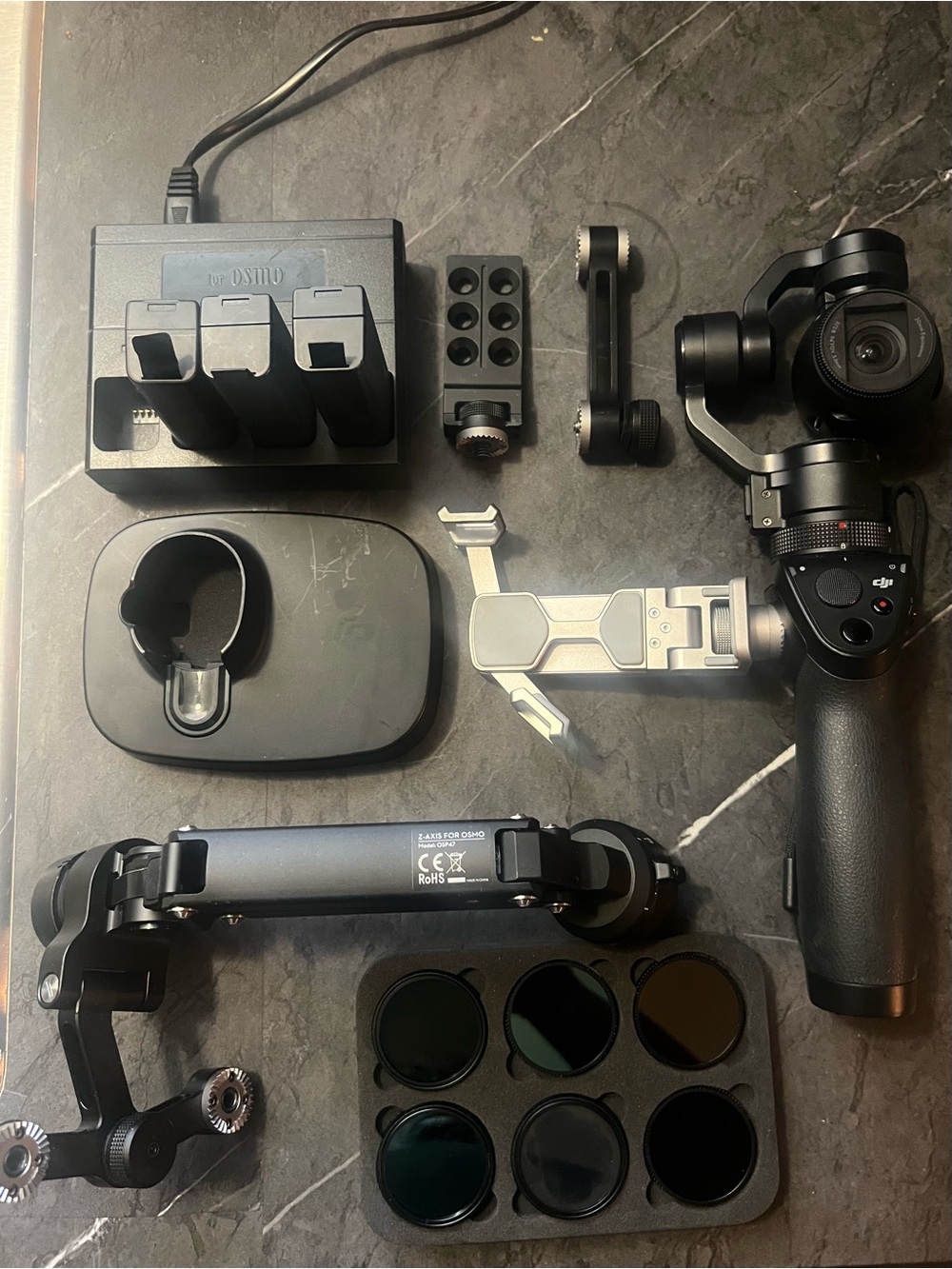 DJI Osmo Zenmuse X3 handheld gimbal with phone mount and accessories